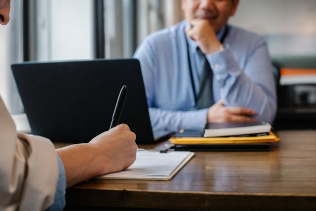 a person signing a document